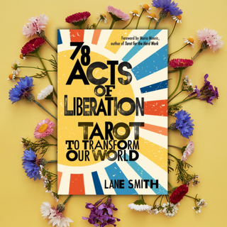 Book titled '78 Acts of Liberation Tarot to Transform Our World' by Lane Smith on a yellow background with flowers.