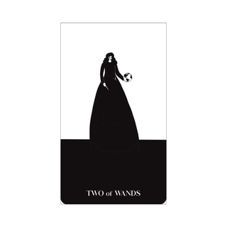 Black and white tarot card featuring a silhouette of a person holding a ball with 'Two of Wands' text below.
