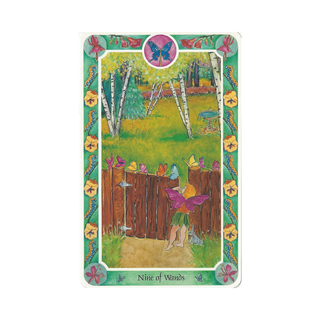 Colorful tarot card featuring a fairy and butterflies with a wooden fence and trees in the background.