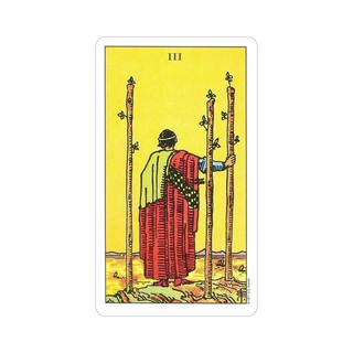 Tarot card with a figure in a red robe standing between two tall sticks on a yellow background
