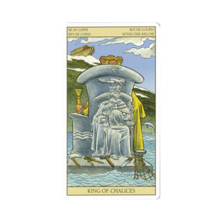 Tarot card featuring a king on a throne with mountains and clouds in the background