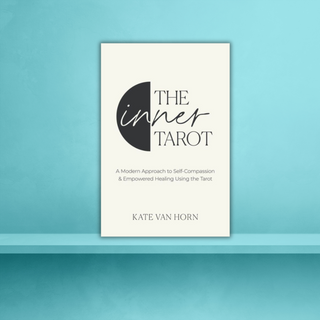 Book titled 'The Inner Tarot' by Kate Van Horn on a blue background