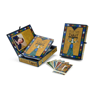 Minoan Tarot card set with colorful box and cards on a white background