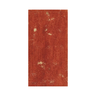 Rectangular red rug with textured surface on a white background